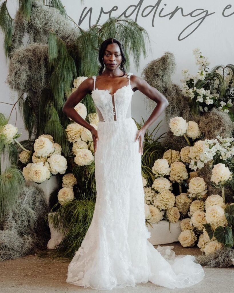 Model wearing a fitted lace bodice gown during bridal runway show in Sydney 2025