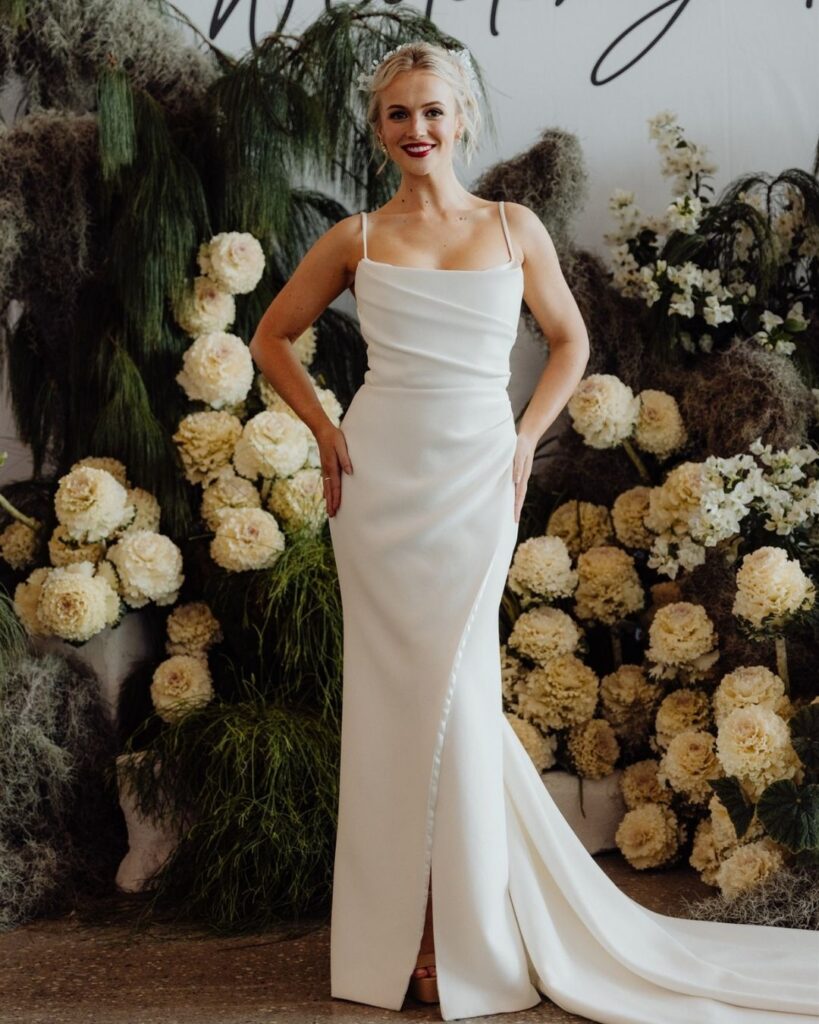 Close-up of satin gown with structured bodice at bridal runway show in Sydney 2025