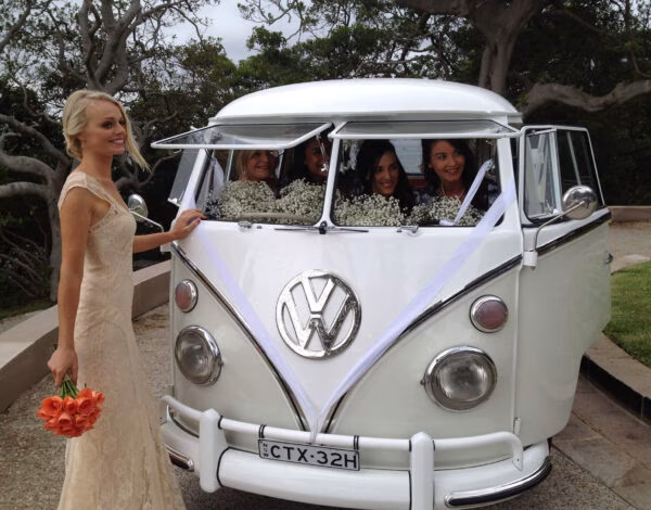 Car Hire Listing Category Kombi Style Stylish wedding photo featuring a woman with a Kombi Style Wedding Car Hire in Sydney.