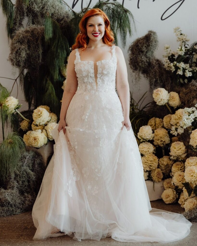 Model showcasing fitted sleeveless lace top and flowing chiffon skirt at bridal runway show in Sydney 2025
