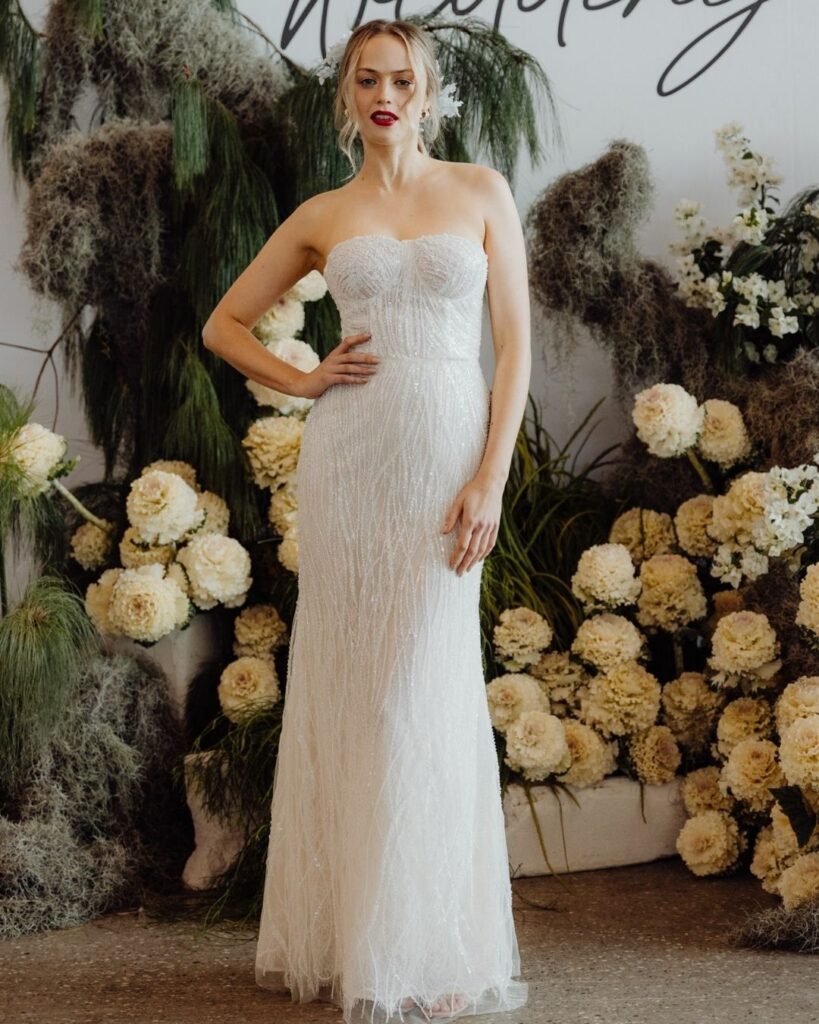 Bridal runway show in Sydney 2025 featuring a model in elegant tube-style glitter chiffon bodice