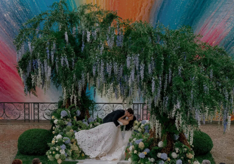 Becca Bloom and David Pownwall's kissing on their wedding - one of the best celebrity weddings of 2025