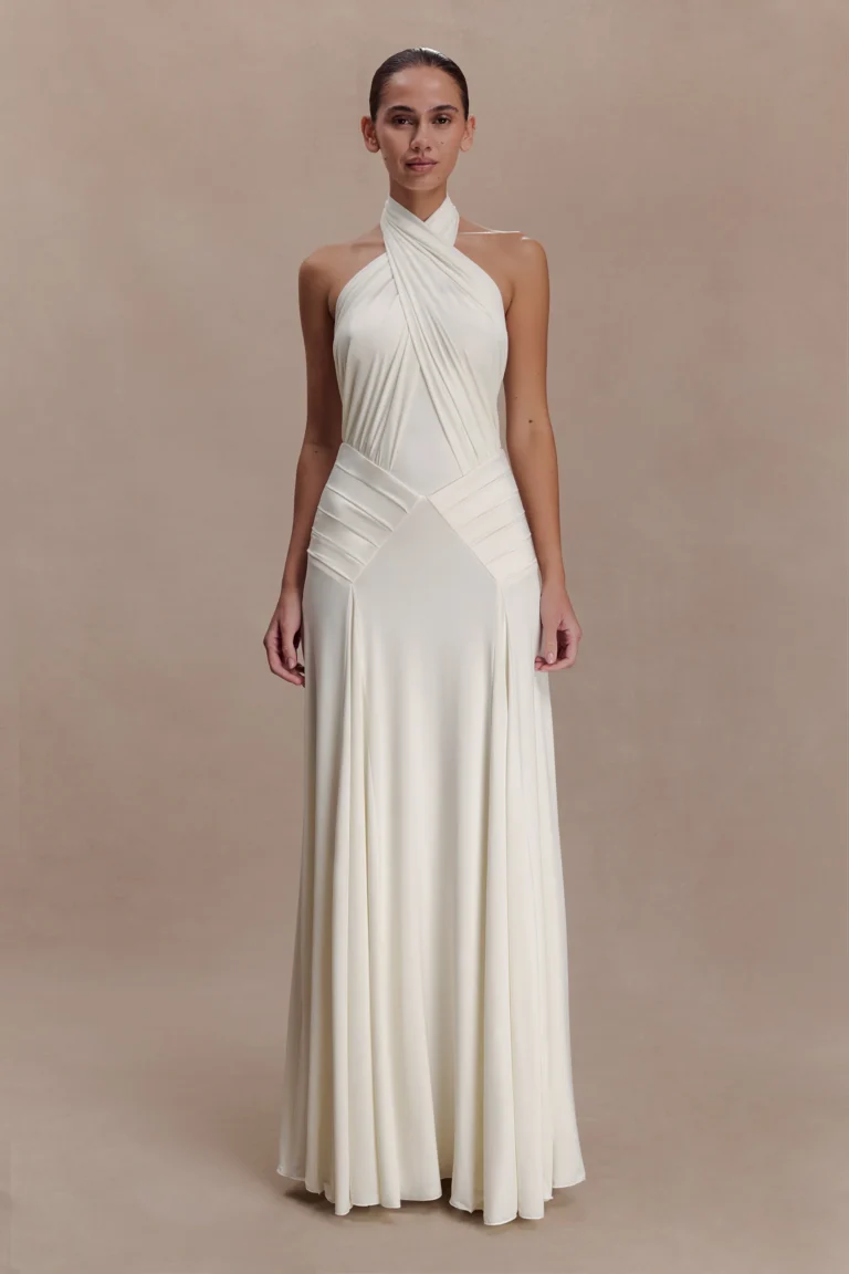 The Meshki Indira bridal dress for an engagement party outfit, shown on a model