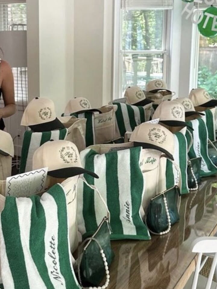 green and white striped gift bags and white caps