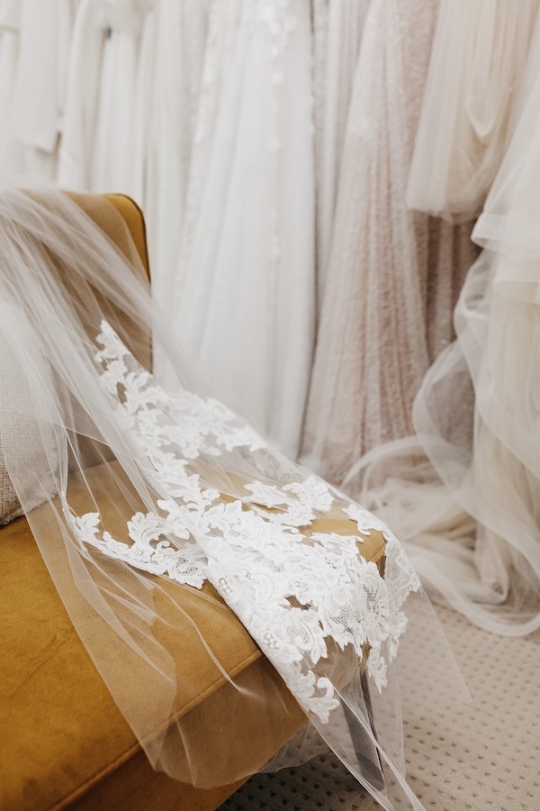 a veil laid over a chair at a Sydney bridal store