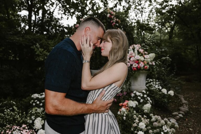 Taylor swift and travis kelce posing for a camera after their engagement