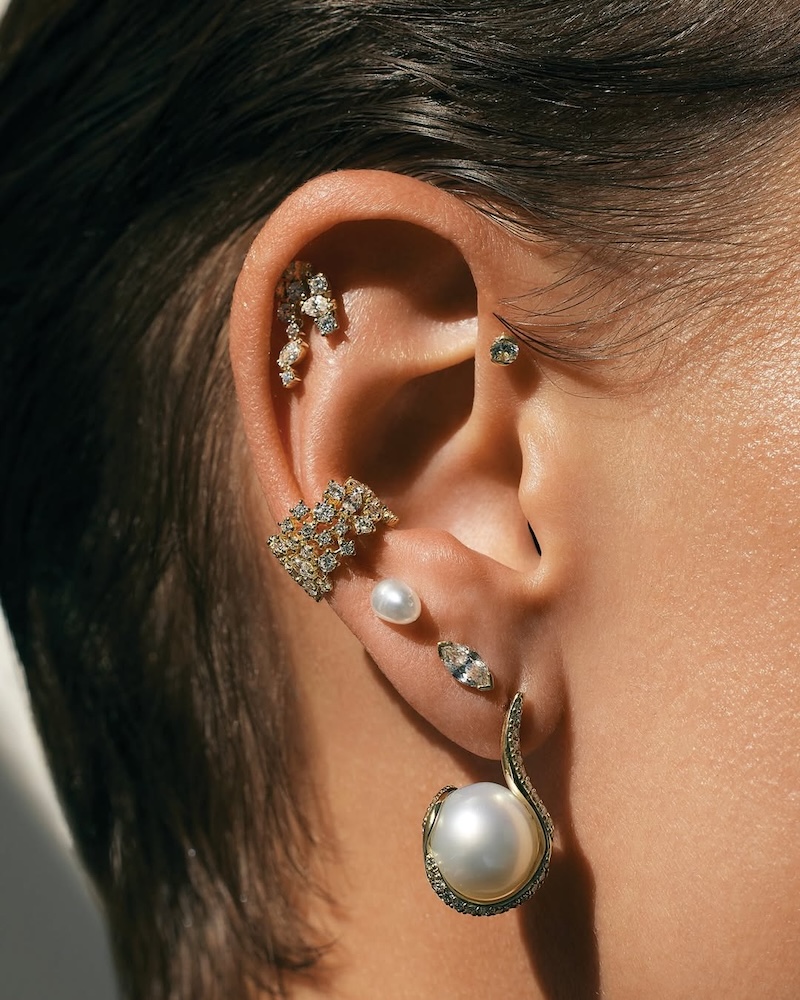 A bridal ear stack of wedding jewellery on a model
