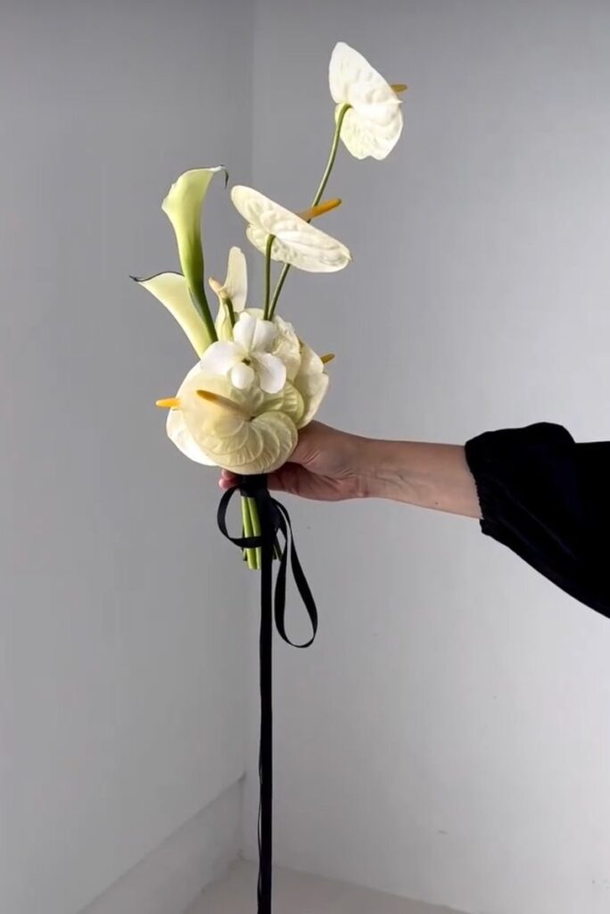 A tiny bouquet held in a hand