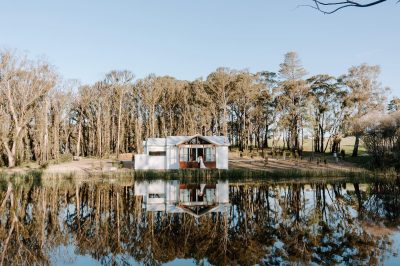 Wedding venue lodge on the water at blue mountains.