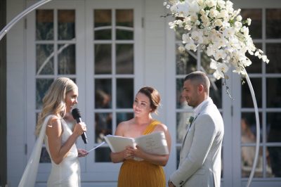 The bride and groom saying their wedding vows.