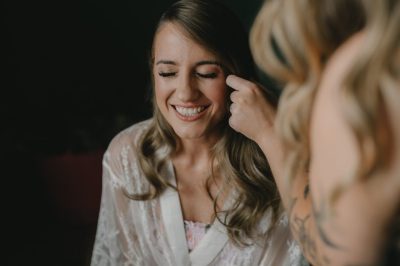 Excited Bride Getting Ready with her make up artist