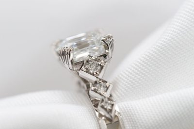 A dazzling silver engagement ring.