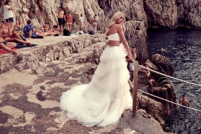 Bride model photoshoot overlooking riverside wearing a separate top wedding dress