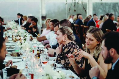 guests enjoying meals prepared by the wedding catering