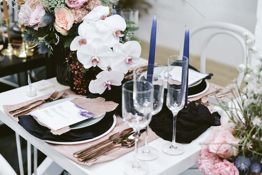 Wedding table with pamphlets and silverware