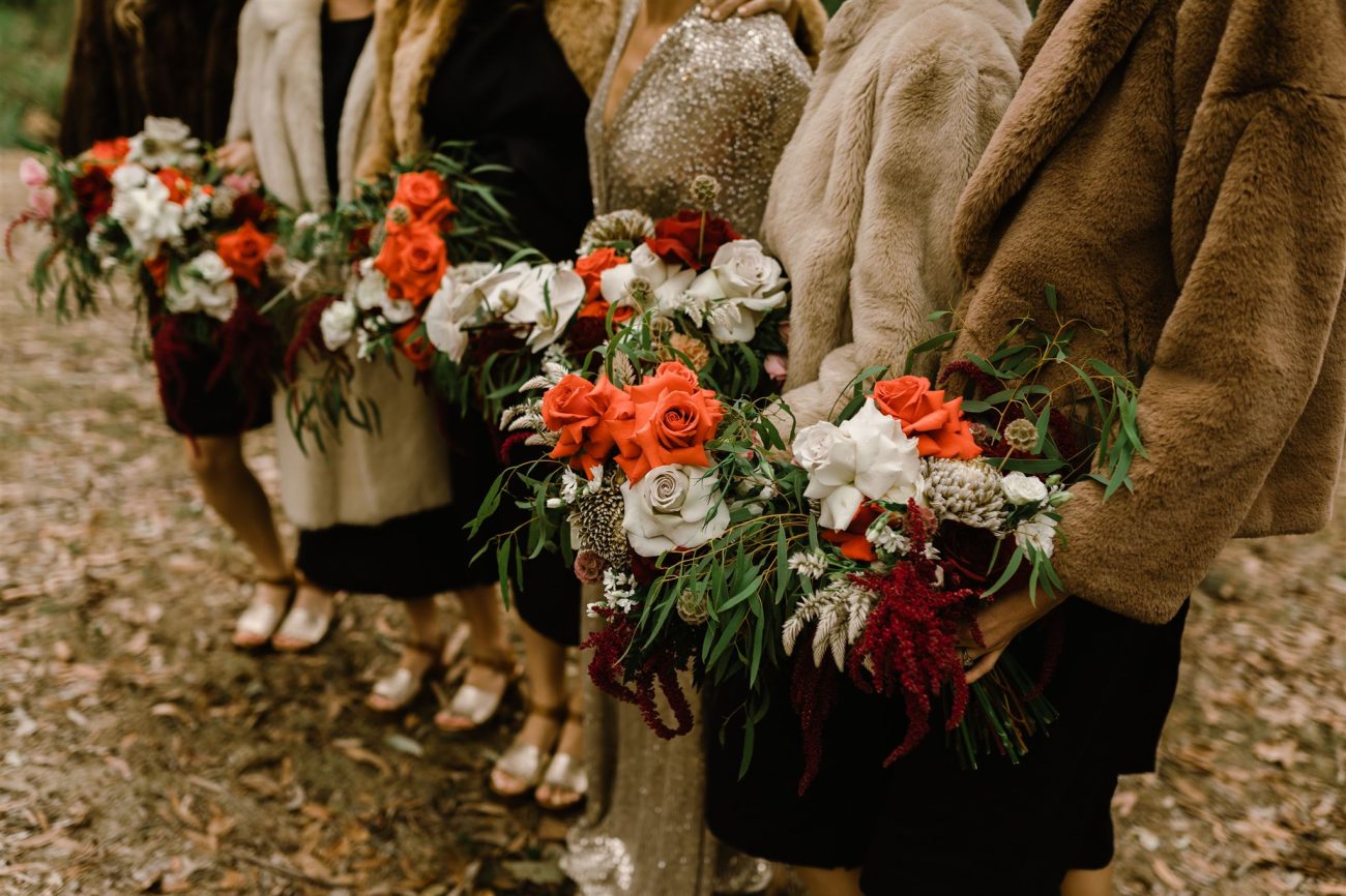 beautiful wedding flower bouquet held each by the bridesmaid