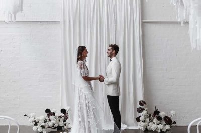 Wedding couple during a ceremony giving their intimate vows